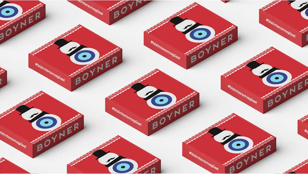 Rows of red Boyner gift boxes with a moustached snowman and evil-eye illustration.